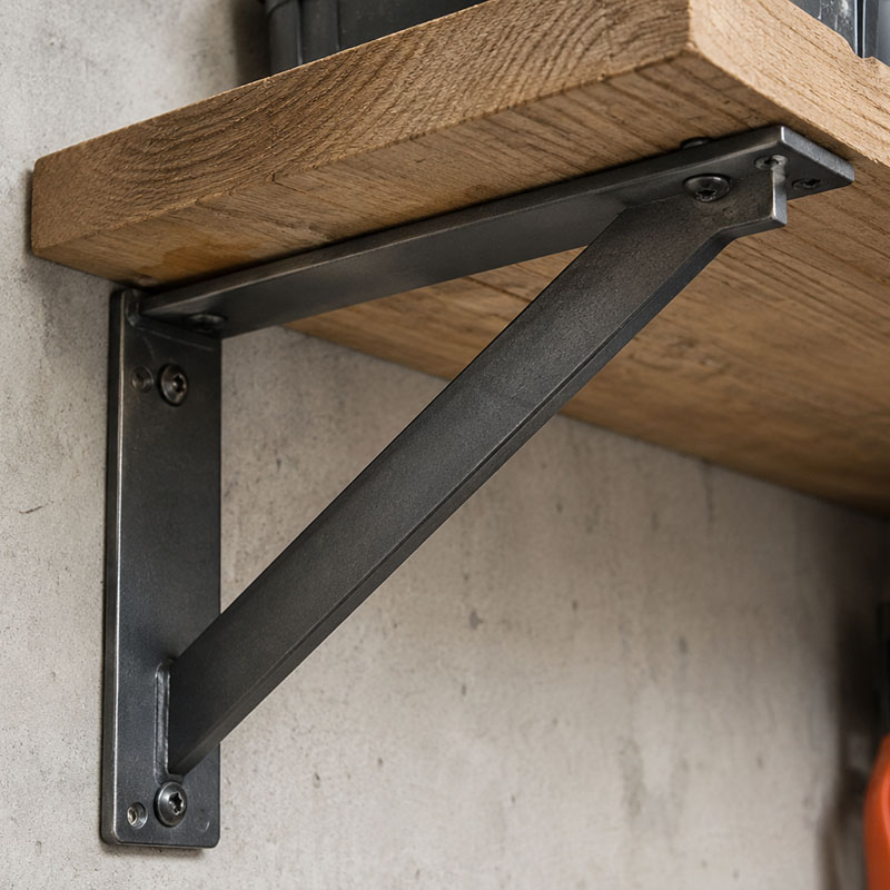 Heavy duty shelving bracket in workshop
